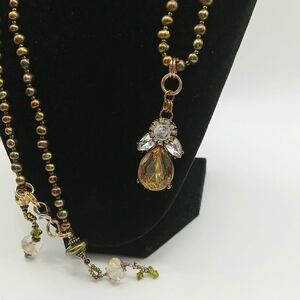 Elegant Gold and Brown Necklace